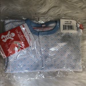 Baby boy footie with magnetic closure